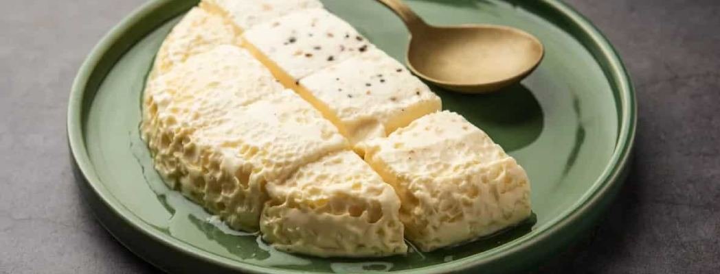 A plate of Kharwas garnished with nuts